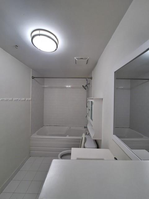 690 Southwest 1st Court, Unit 2711 Miami, FL 33130 - Photo 8 of 26 a bathroom with a sink a toilet and shower