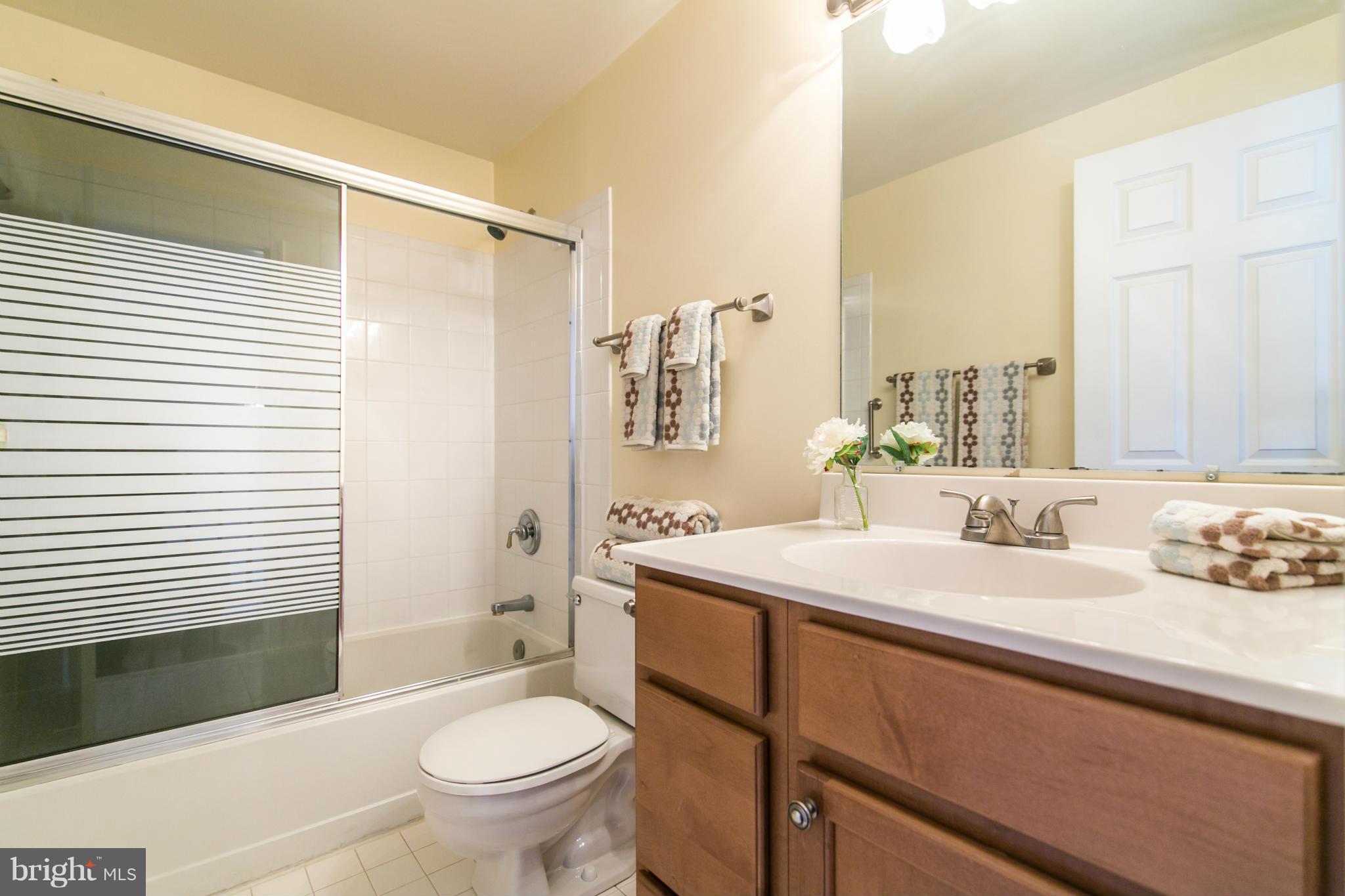1510 Deer Point Way Reston, VA 20194 - Photo 17 of 30 a bathroom with a sink toilet and shower