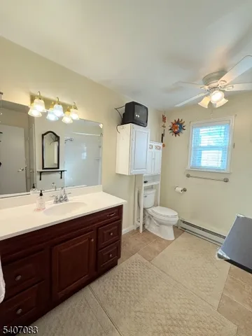 a spacious bathroom with a double vanity sink mirror and