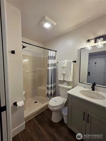 a view of a swimming pool with an outdoor seating