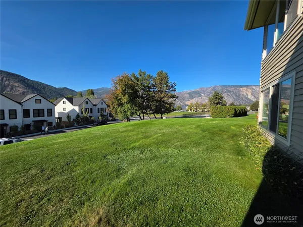 a view of a lake with a mountain