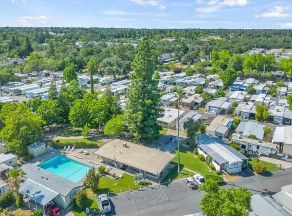 an aerial view of a house with a garden