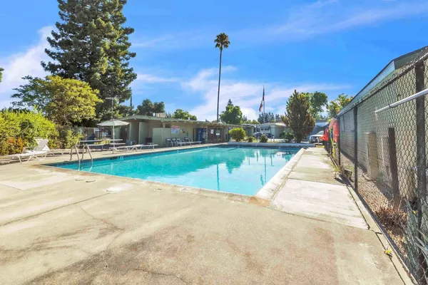 a view of a park with swings