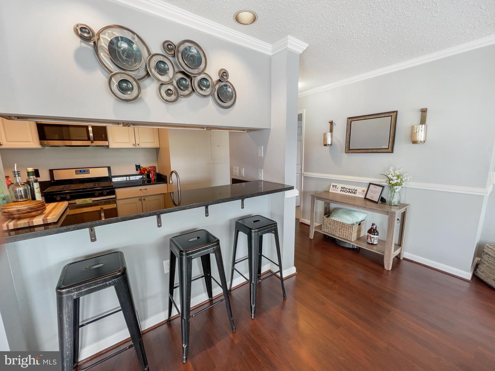 20985 Timber Ridge Terrace, Unit 302 Ashburn, VA 20147 - Photo 23 of 23 Feel the open floor plan!