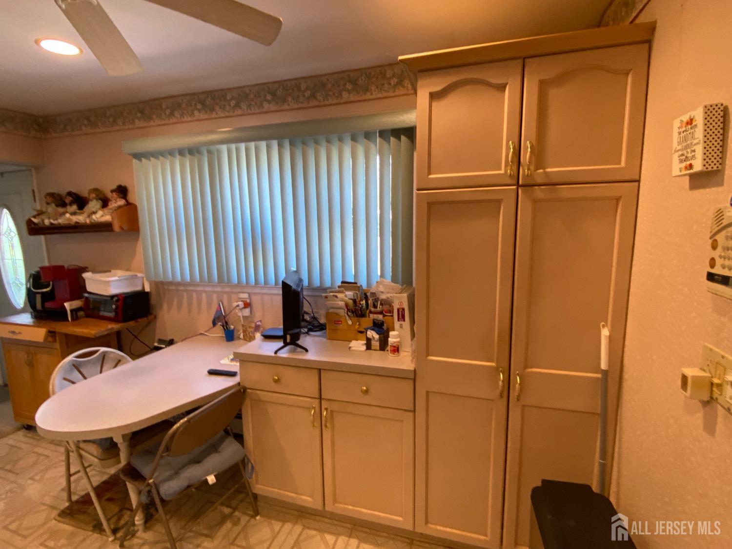2 Avon Road Edison, NJ 08817 - Photo 7 of 11 a bathroom with a sink a toilet and a mirror
