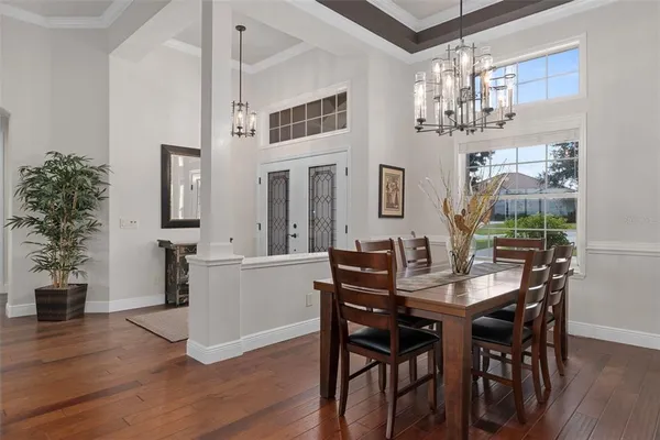 a kitchen with stainless steel appliances granite countertop a refrigerator stove and sink