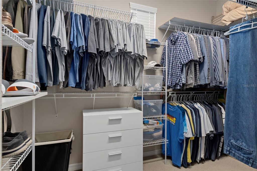 1601 North Tee Time Terrace Hernando, FL 34442 - Photo 49 of 68 a view of walk in closet with clothes and shoes