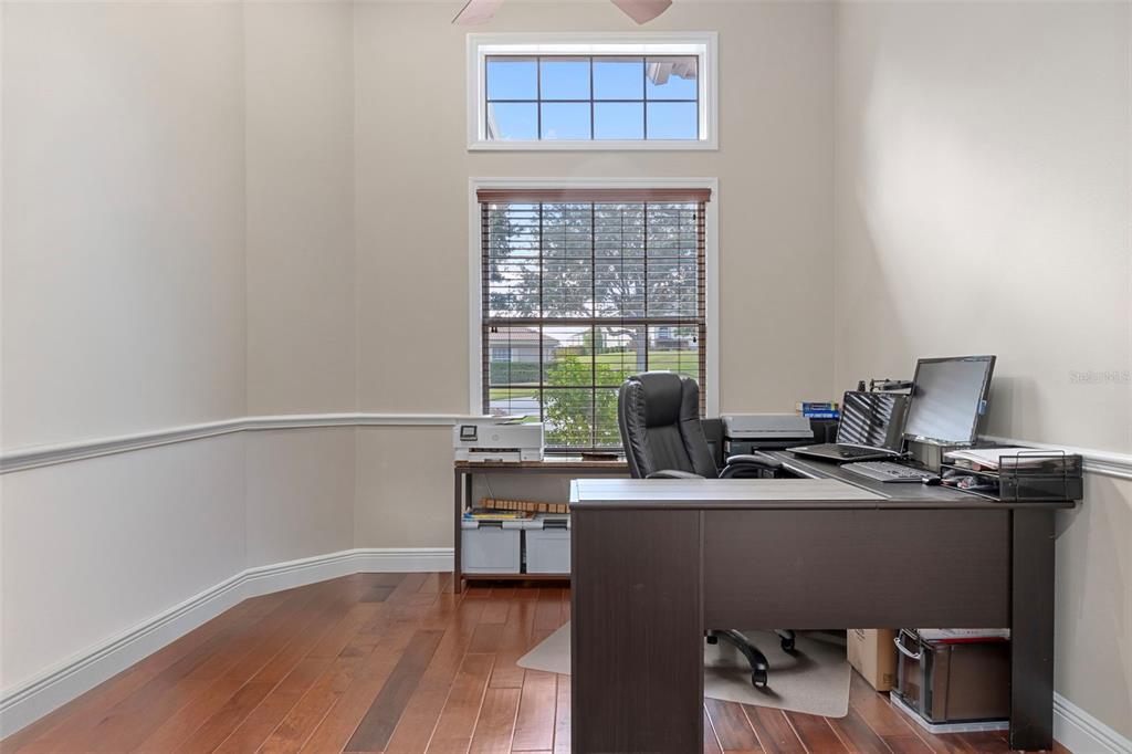 1601 North Tee Time Terrace Hernando, FL 34442 - Photo 51 of 68 a view of a workspace with furniture and a window