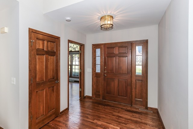 102 Wilcox Drive Bartlett, IL 60103 - Photo 2 of 30 wooden floor and windows in a room