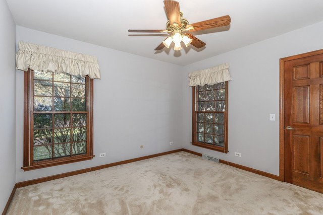 102 Wilcox Drive Bartlett, IL 60103 - Photo 18 of 30 a view of an empty room with a window