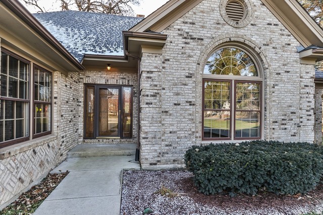 102 Wilcox Drive Bartlett, IL 60103 - Photo 30 of 30 a front view of a house with large windows
