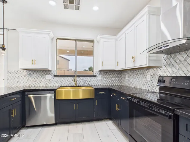 a view of a livingroom with a ceiling fan and window