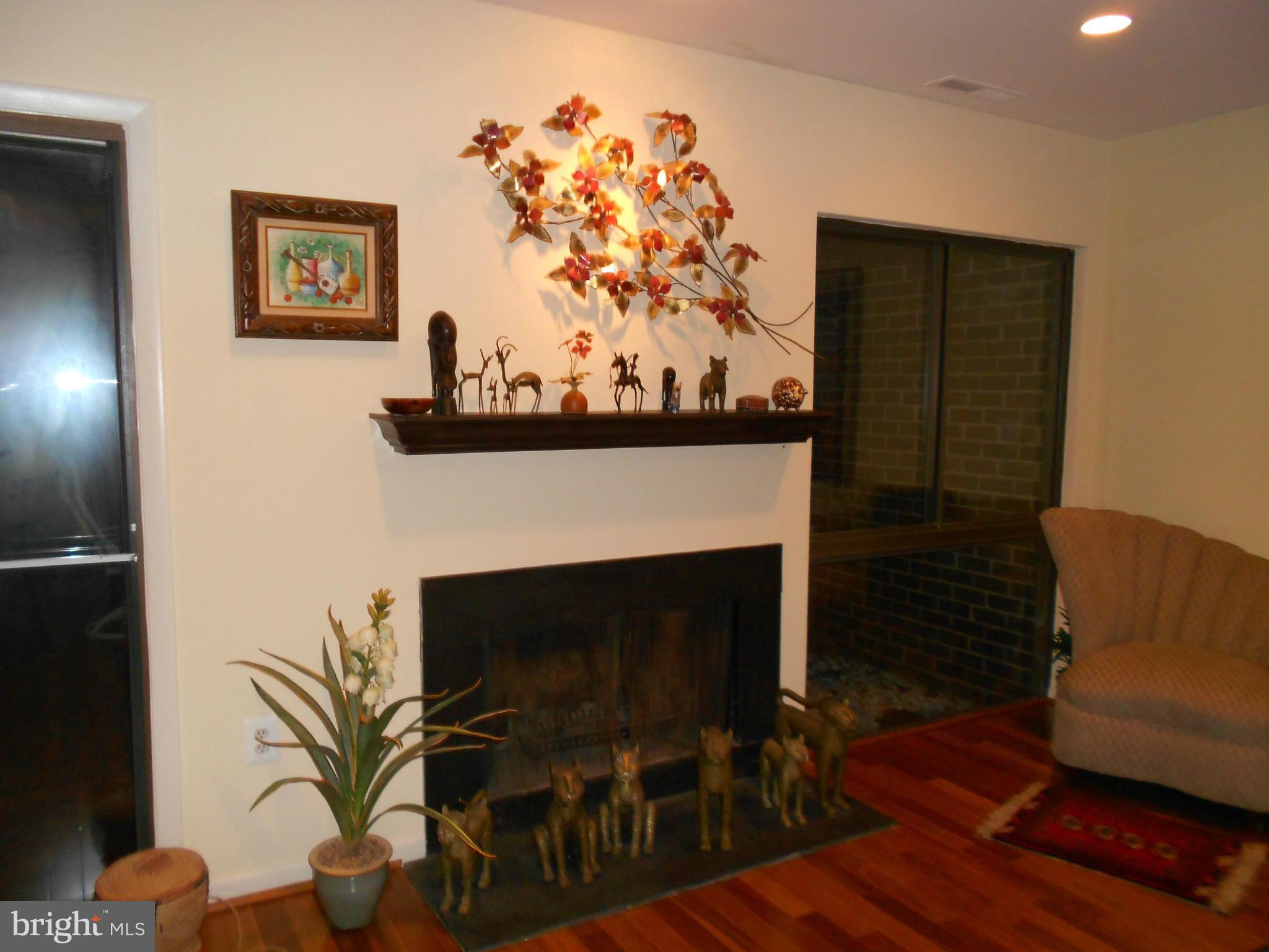 2079 Wethersfield Court Reston, VA 20191 - Photo 27 of 30 Large living room. See floor plan. Wood-burning FP