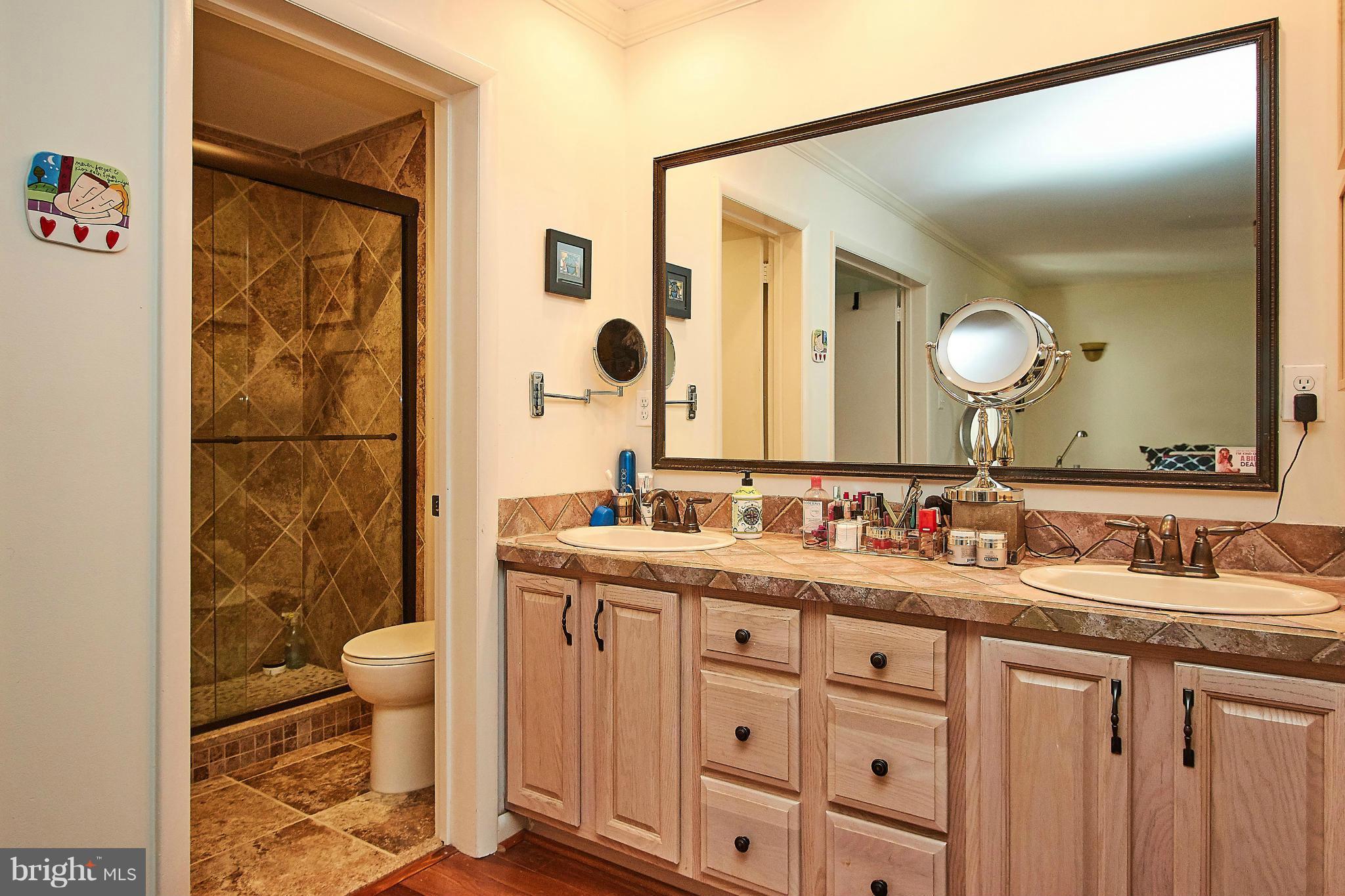 2079 Wethersfield Court Reston, VA 20191 - Photo 18 of 30 Double-sink vanity in master bedroom.