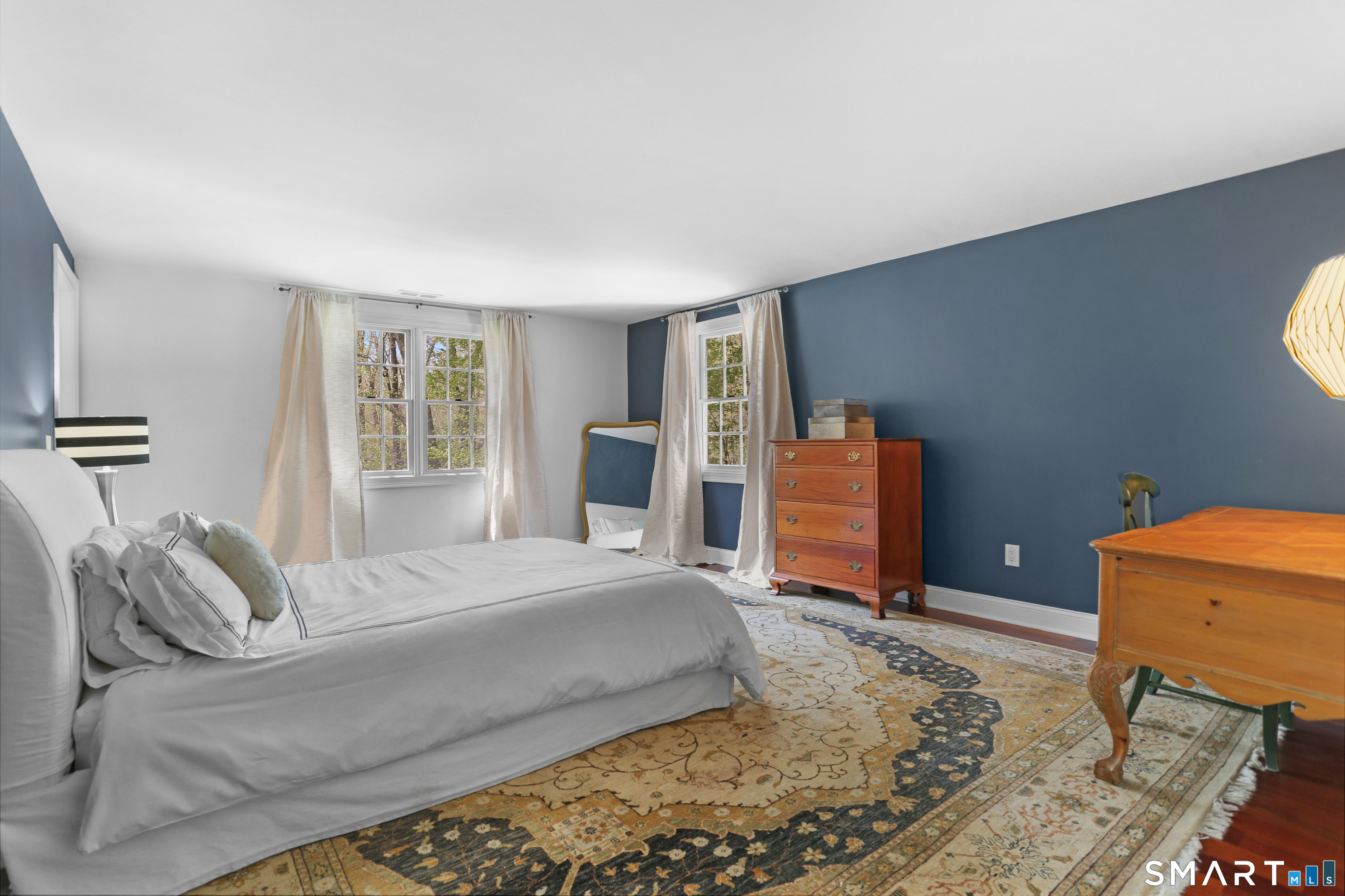 4041 Redding Road Fairfield, CT 06824 - Photo 26 of 33 a bedroom with a bed and dresser