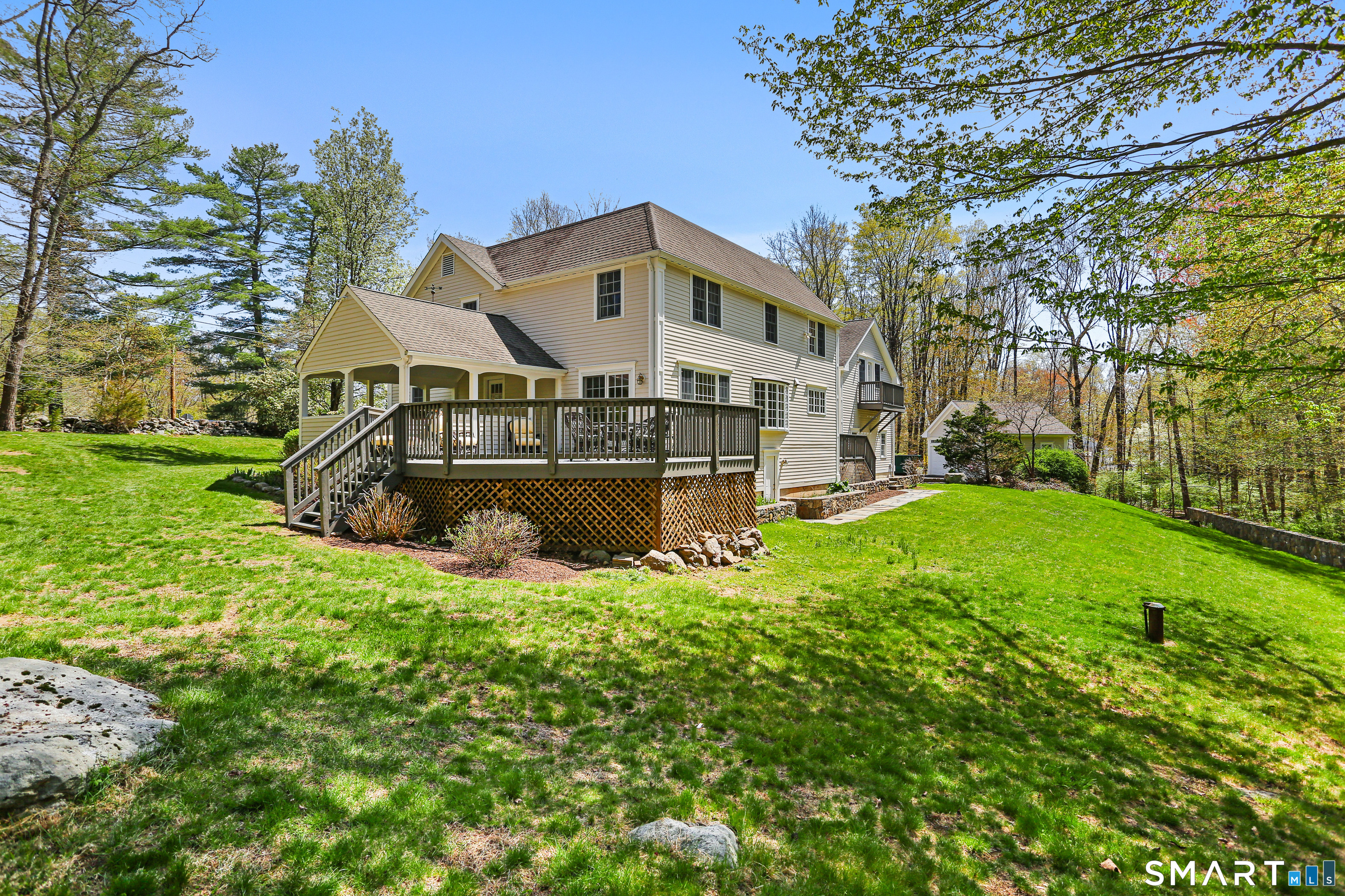 4041 Redding Road Fairfield, CT 06824 - Photo 32 of 33 a view of a house with backyard