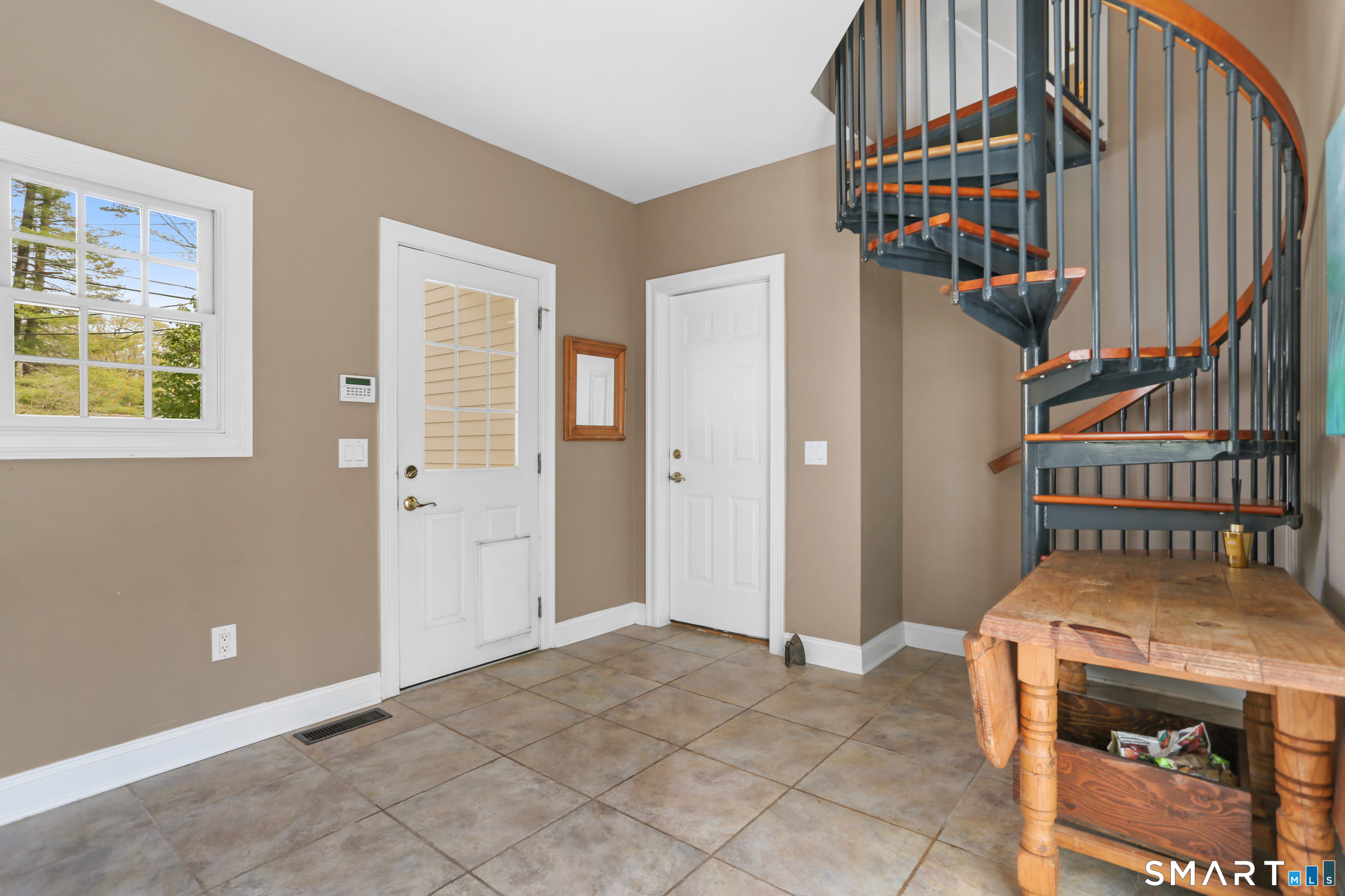 4041 Redding Road Fairfield, CT 06824 - Photo 10 of 33 a view of entryway with a front door