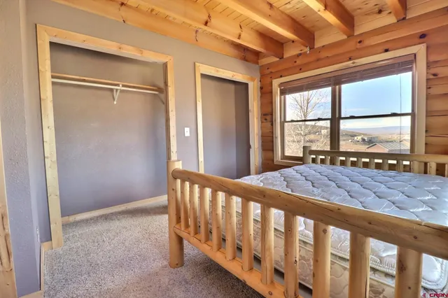 a view of a porch and wooden floor