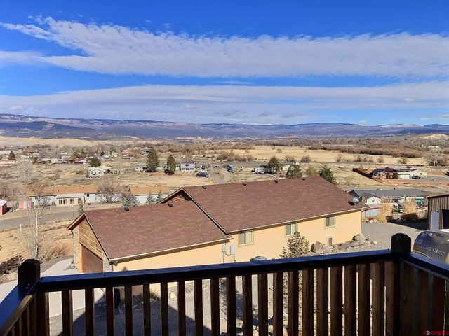 a view of a city from a balcony