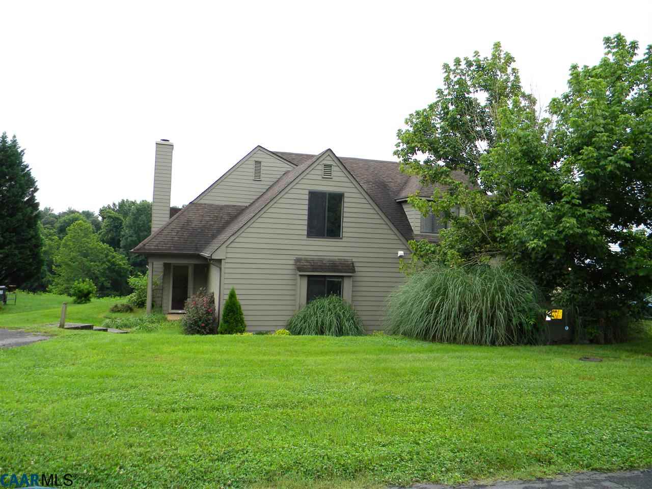 1044 Amber Ridge Road Charlottesville, VA 22901 - Photo 1 of 40 a front view of a house with garden