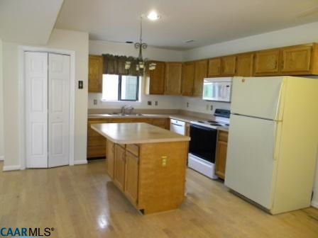1044 Amber Ridge Road Charlottesville, VA 22901 - Photo 5 of 40 a kitchen with stainless steel appliances granite countertop a stove a refrigerator a sink and a refrigerator