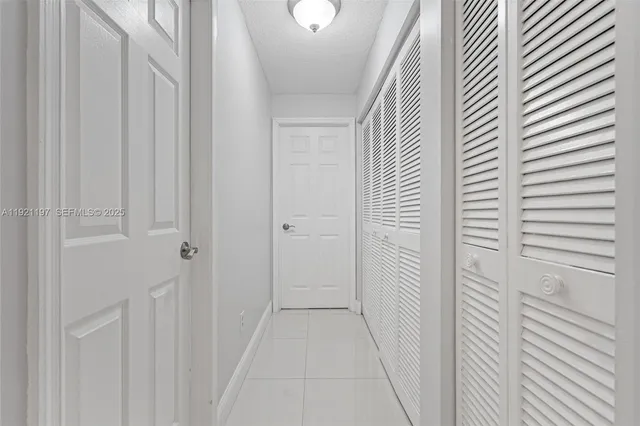 a bedroom with a bed and a table