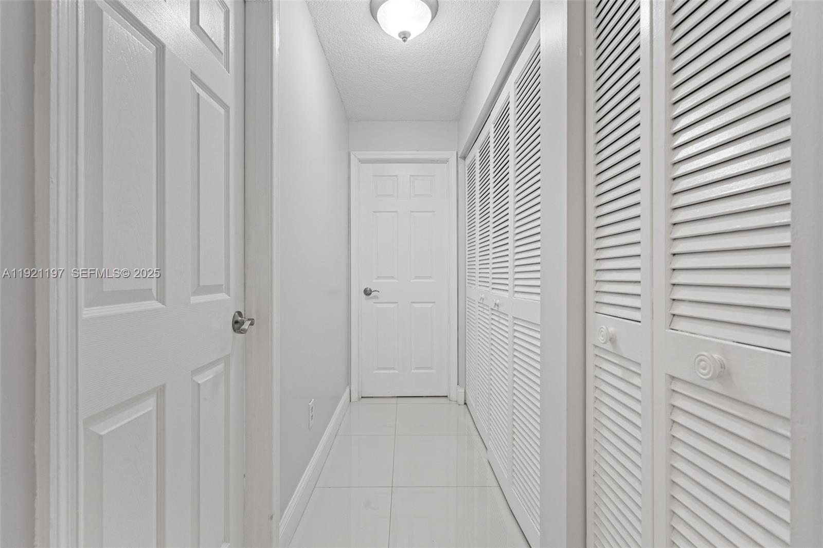 7004 Southwest 139th Place Miami, FL 33183 - Photo 22 of 54 a view of a hallway