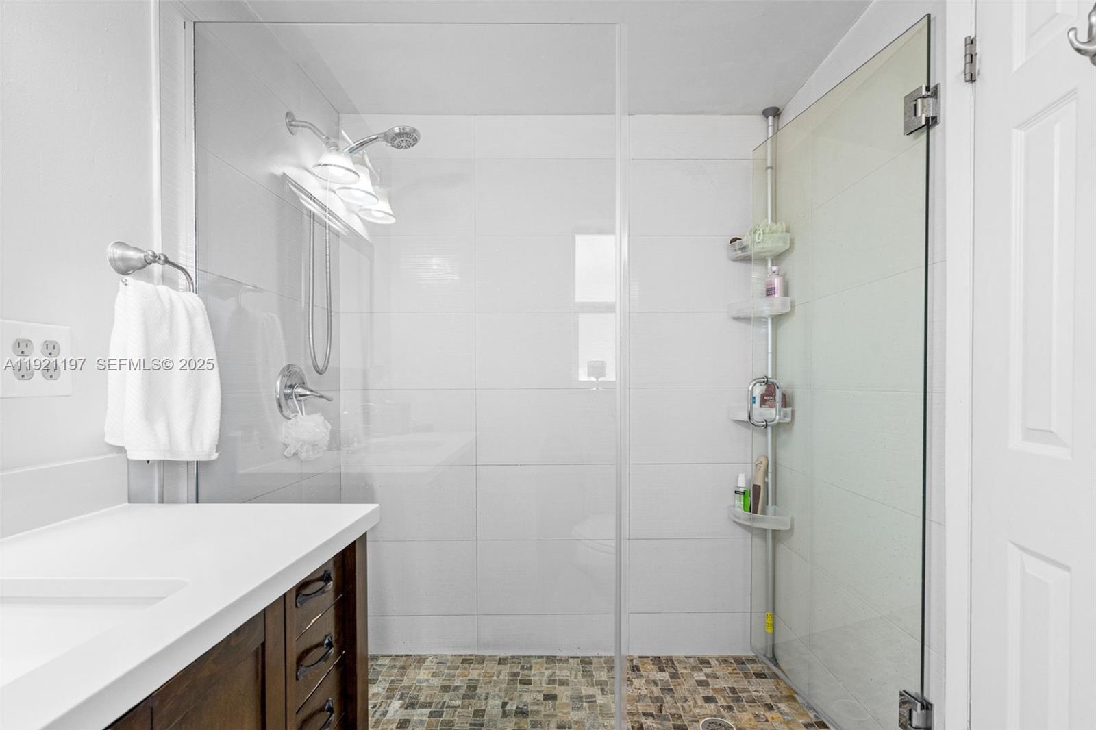 7004 Southwest 139th Place Miami, FL 33183 - Photo 30 of 54 a bathroom with a sink and a mirror