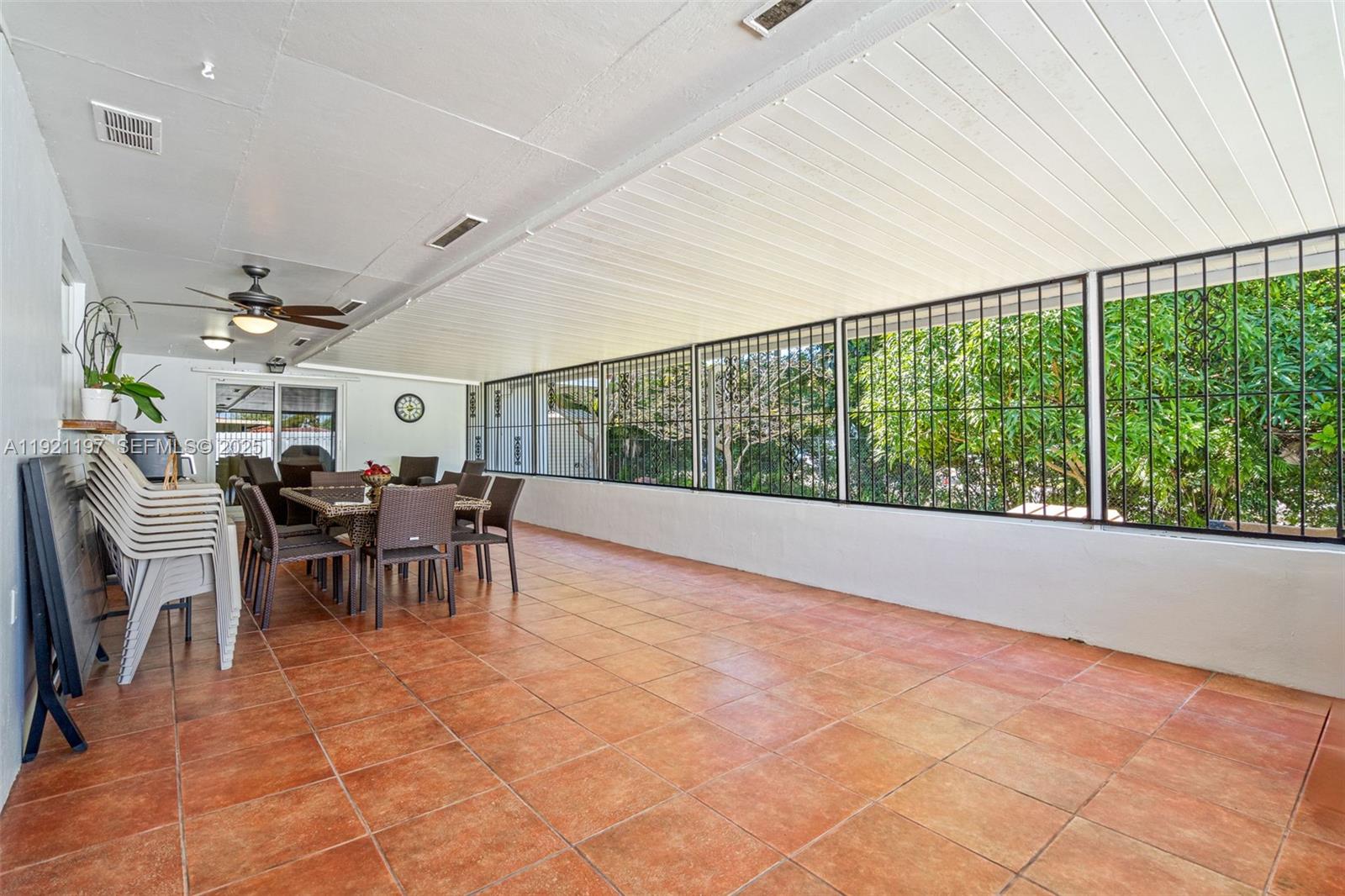 7004 Southwest 139th Place Miami, FL 33183 - Photo 35 of 54 a view of a dining room with furniture window and outside view