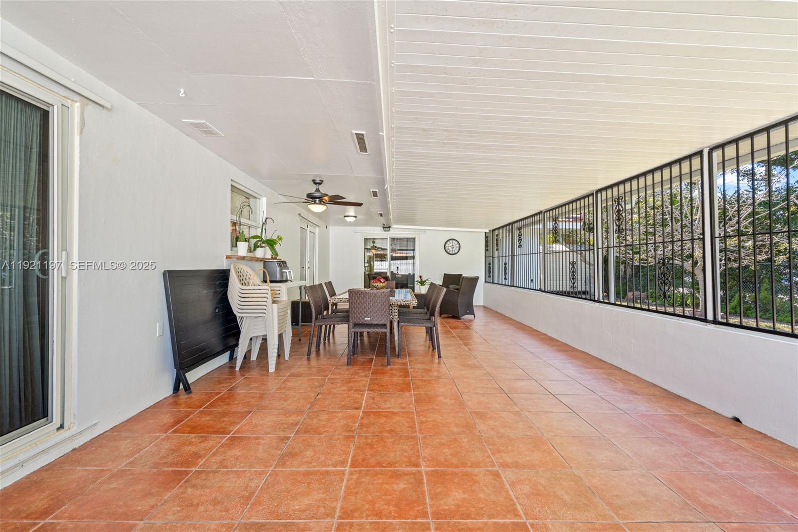 7004 Southwest 139th Place Miami, FL 33183 - Photo 36 of 54 a view of a dining room with furniture window and outside view