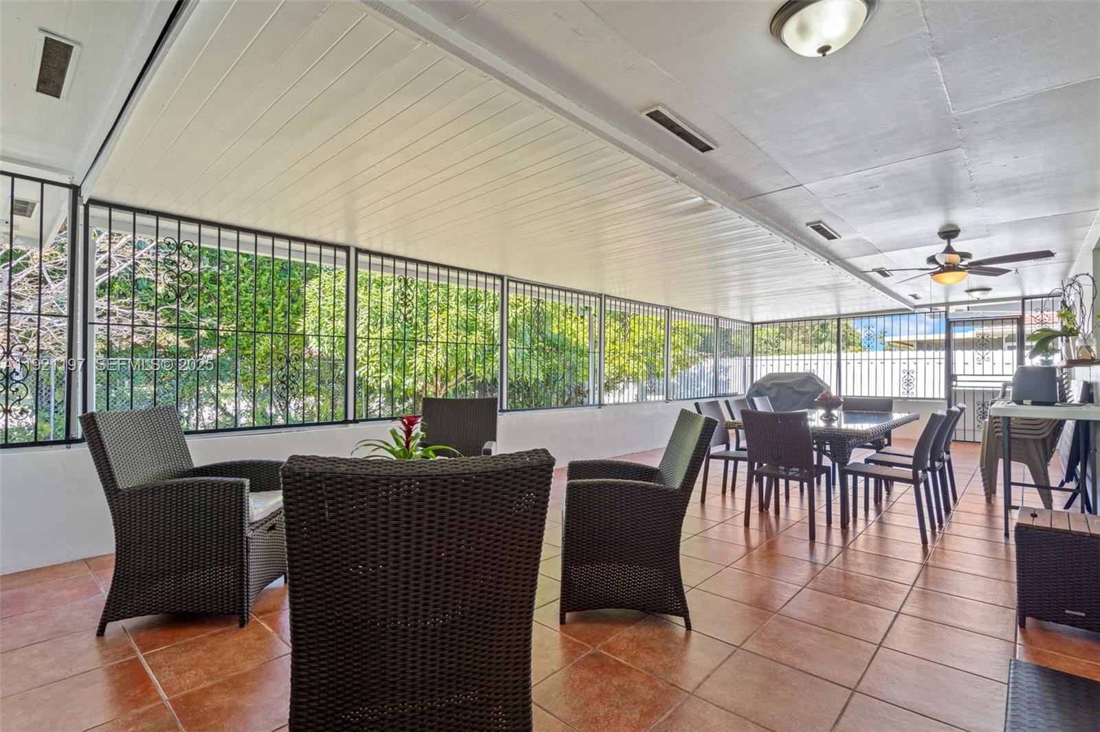 7004 Southwest 139th Place Miami, FL 33183 - Photo 38 of 54 a view of a dining room with furniture window and outside view