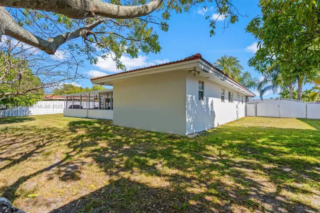 an aerial view of house swimming pool and outdoor space