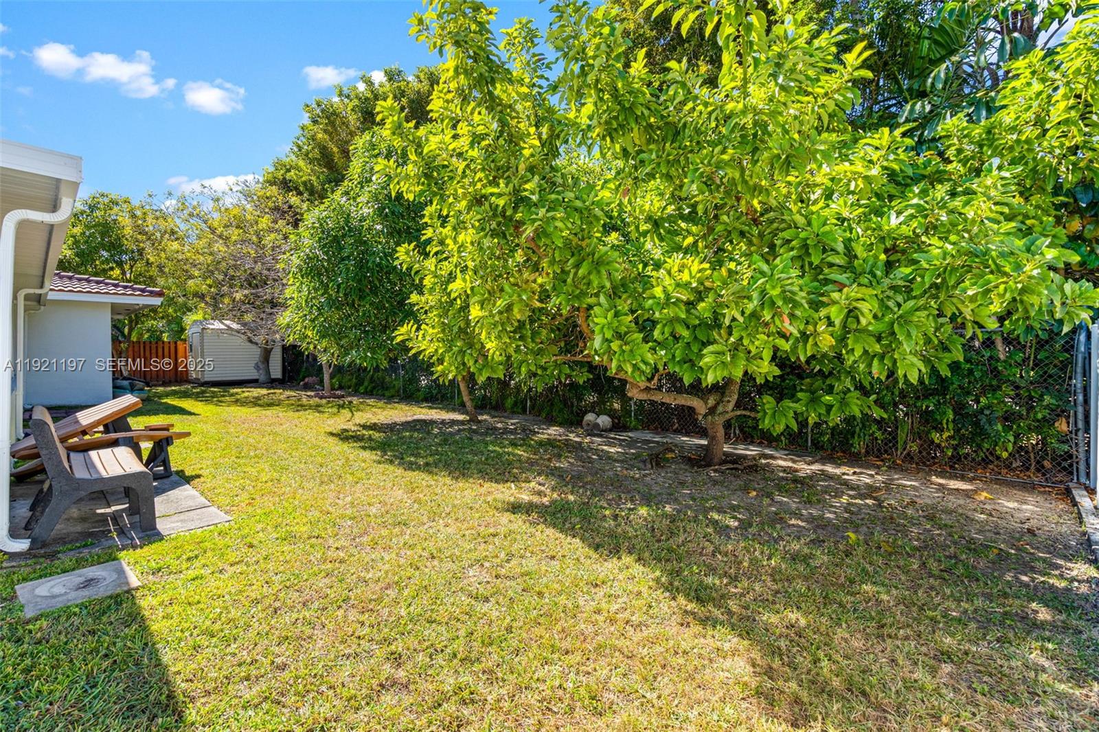 7004 Southwest 139th Place Miami, FL 33183 - Photo 47 of 54 a view of a backyard with swimming pool