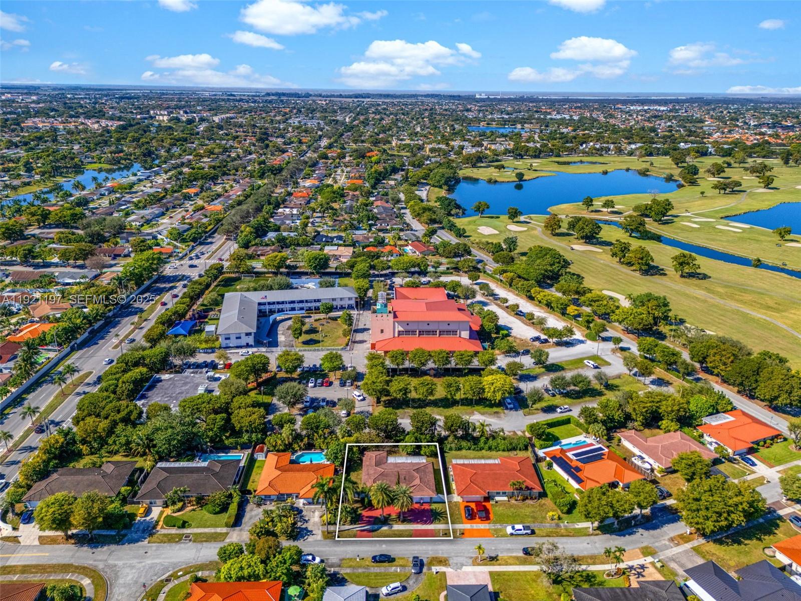 7004 Southwest 139th Place Miami, FL 33183 - Photo 54 of 54 an aerial view of residential houses with outdoor space and seating