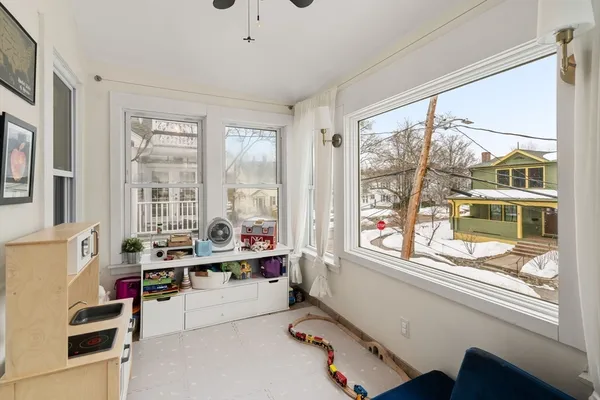 a room with furniture and windows
