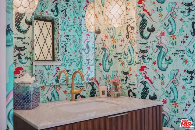 a bathroom with a sink and a toilet