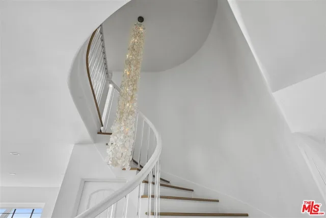 a bedroom with a bed and a fireplace