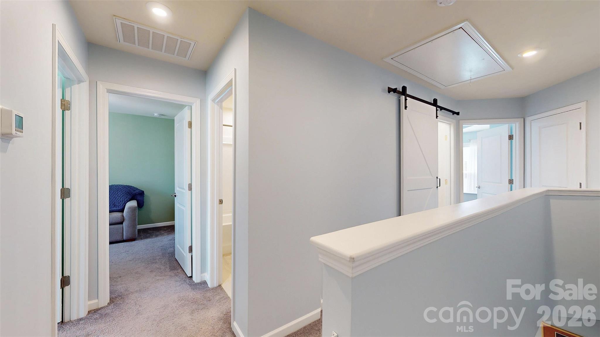 827 Canoe Song Road Fort Mill, SC 29708 - Photo 17 of 33 a view of a hallway to rooms