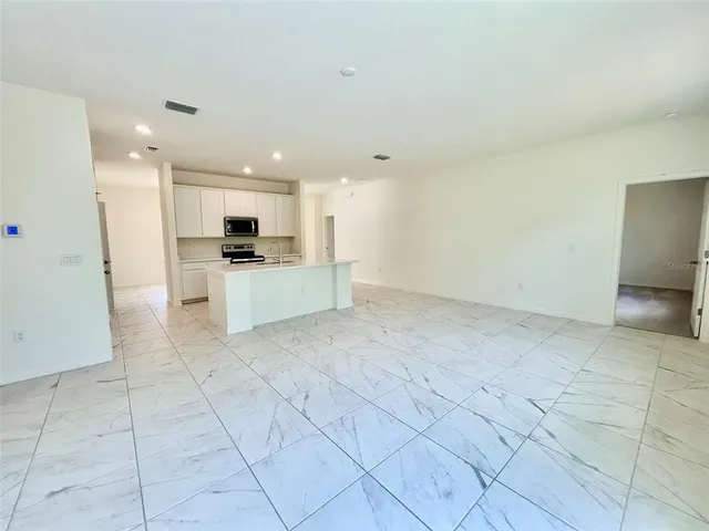 a view of a kitchen with a sink