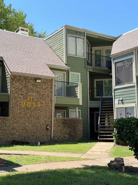 9815 Walnut Street, Unit 102 Dallas, TX 75243 - Photo 13 of 13 Multi-level building with a combination of brick and horizontal siding exteriors