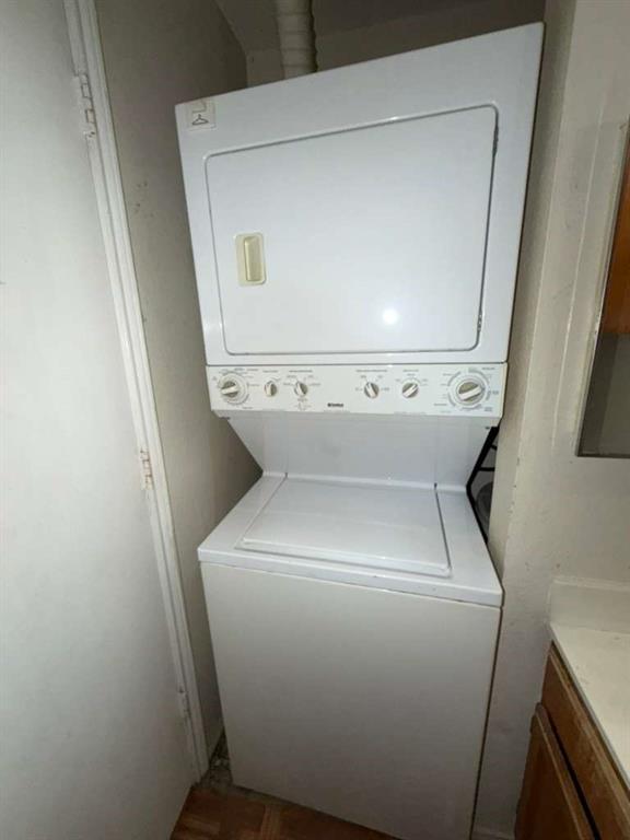 9815 Walnut Street, Unit 102 Dallas, TX 75243 - Photo 6 of 13 White stackable washer and dryer unit