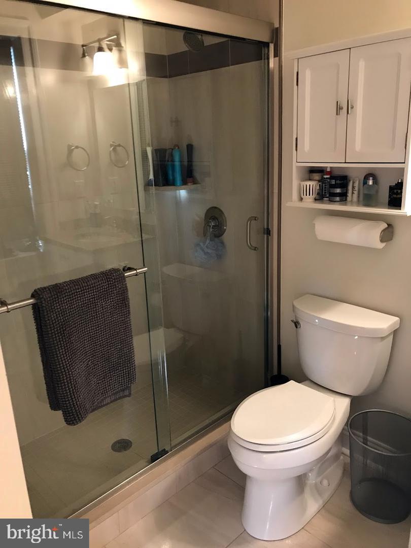 3925 Fulton Street Northwest, Unit 5 Washington, DC 20007 - Photo 9 of 19 a bathroom with a toilet and a shower