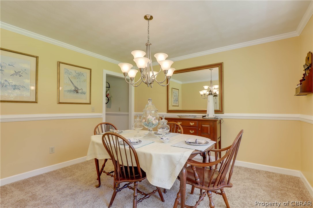 65 Thurston Road Mathews, VA 23109 - Photo 8 of 47 Formal dining room with crown molding and chair rail