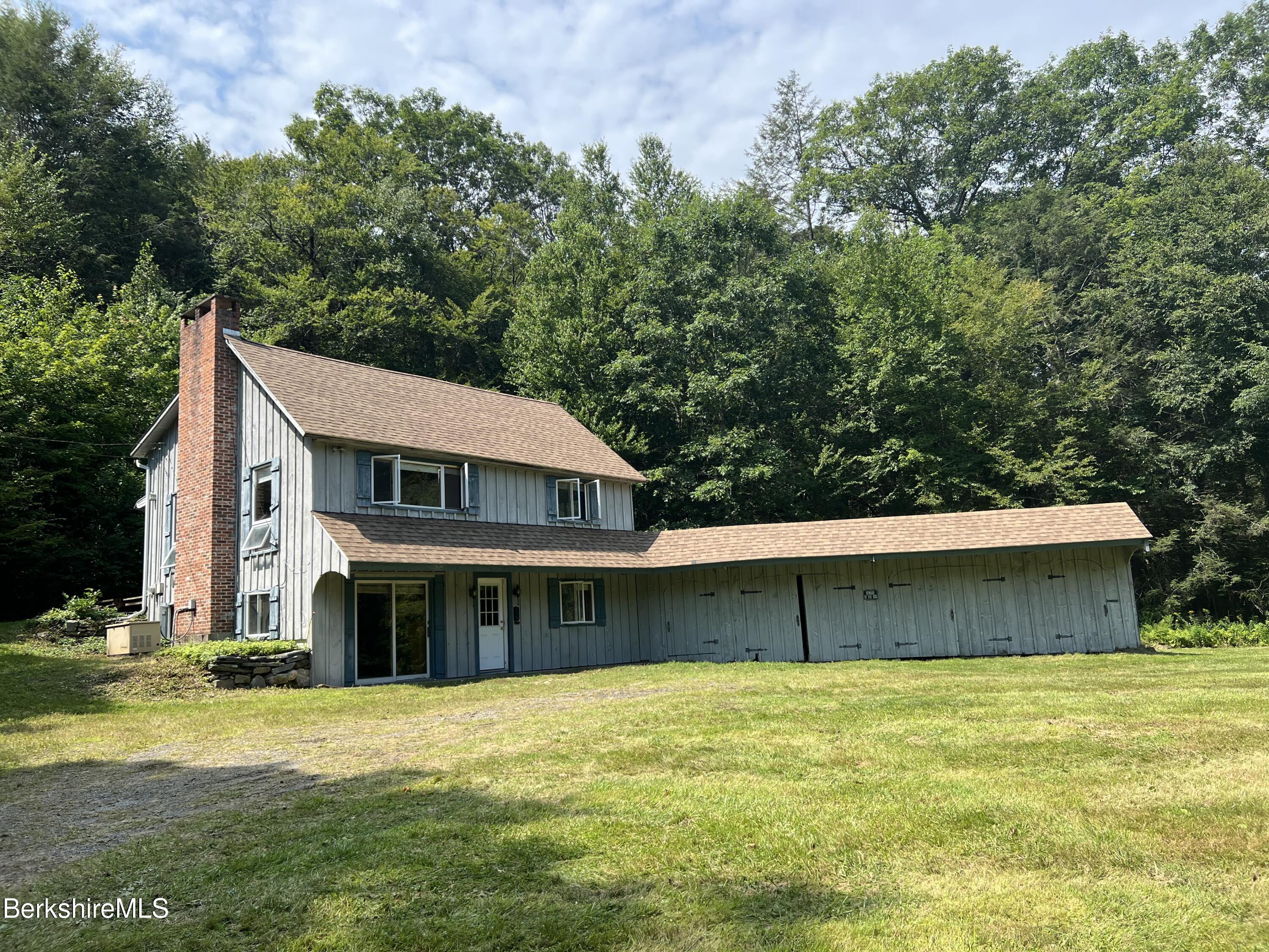 12 Sears Road Sandisfield, MA 01255 - Photo 2 of 13 a view of a house with a yard and a tree