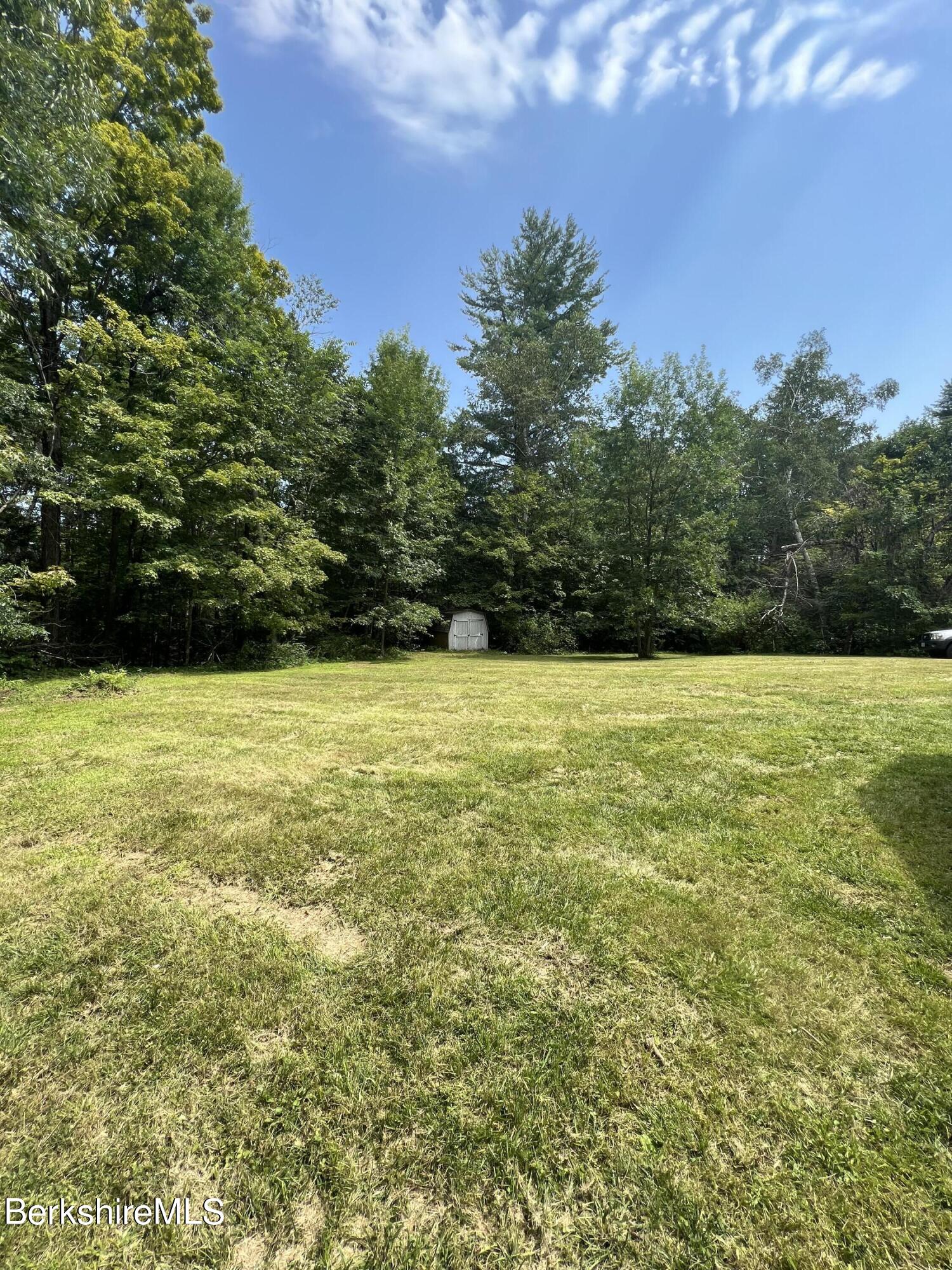 12 Sears Road Sandisfield, MA 01255 - Photo 4 of 13 a view of a pool with a yard