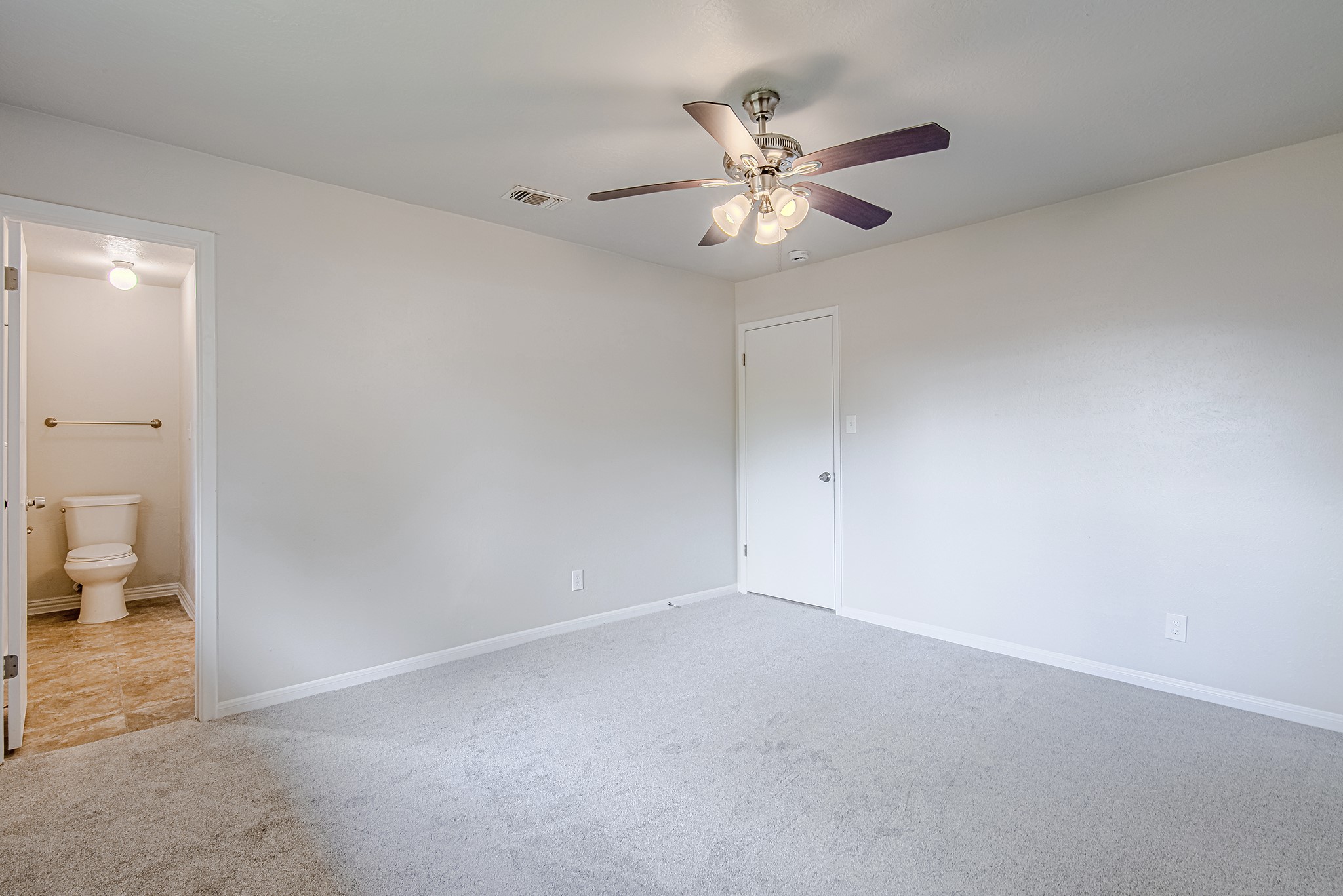 24306 Spring Mill Lane Spring, TX 77373 - Photo 14 of 24 a view of an empty room and a bathroom