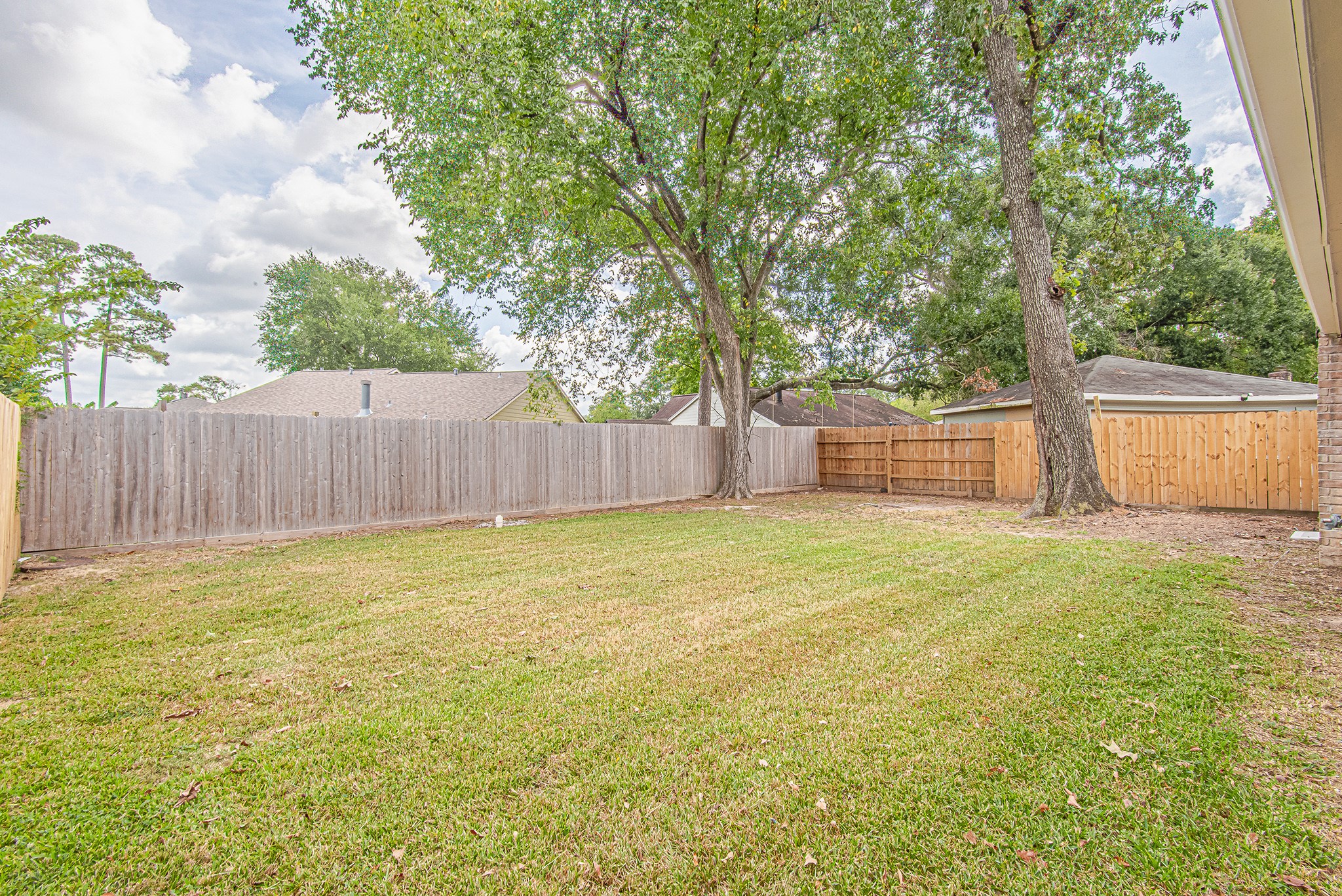 24306 Spring Mill Lane Spring, TX 77373 - Photo 22 of 24 a backyard of a house
