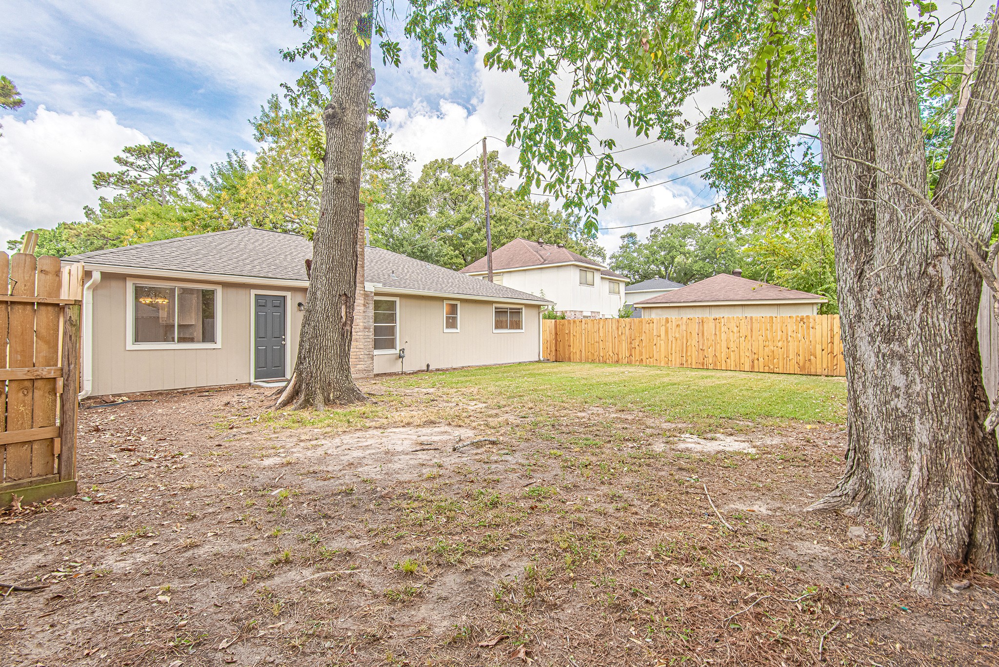 24306 Spring Mill Lane Spring, TX 77373 - Photo 23 of 24 a backyard of a house