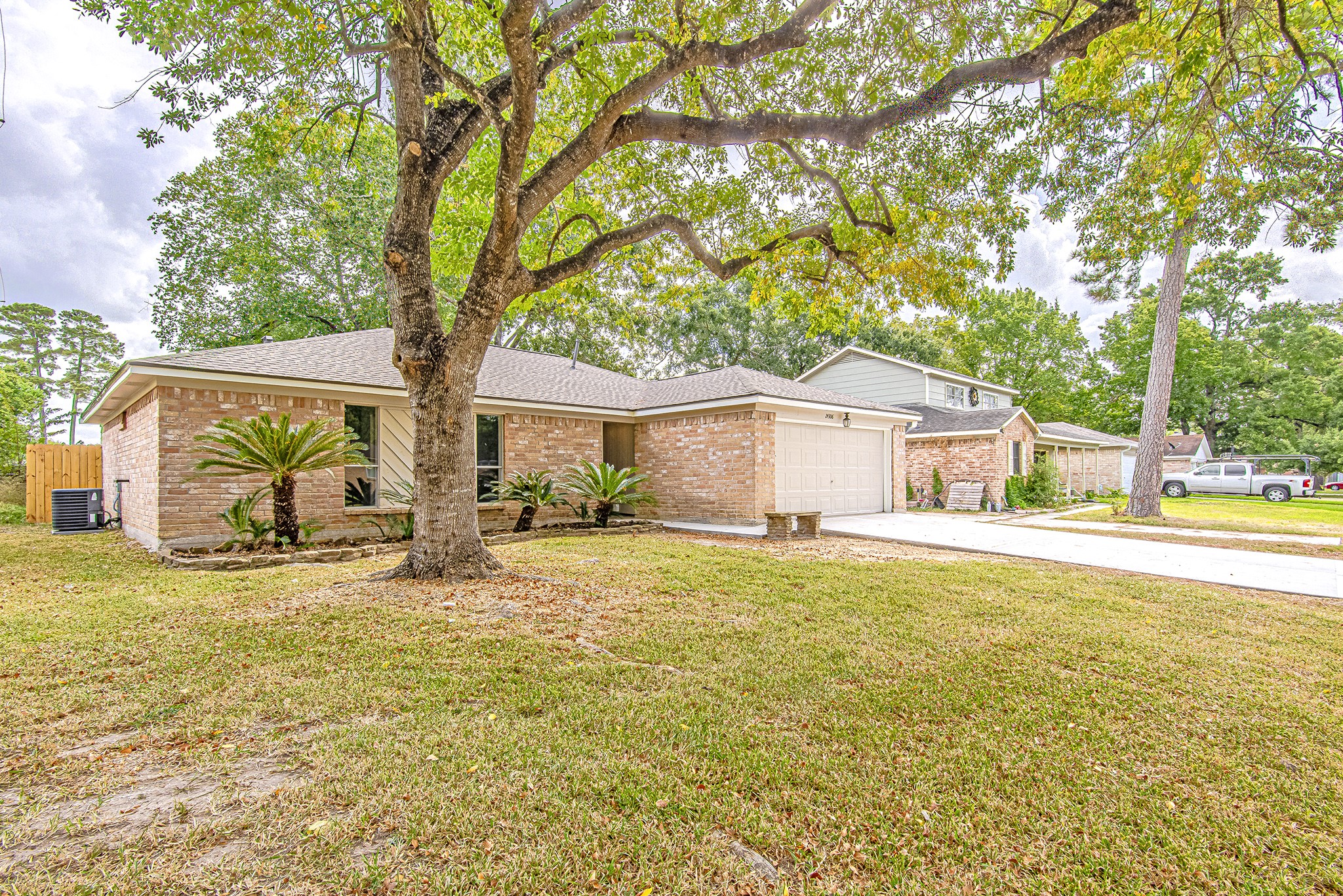 24306 Spring Mill Lane Spring, TX 77373 - Photo 3 of 24 a house with swimming pool in front of it