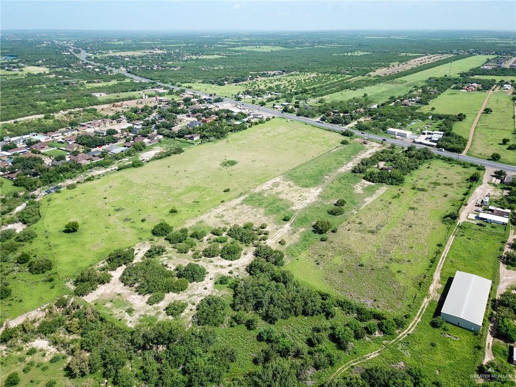 3781 Highway 83 Rio Grande City, TX 78582 - Photo 7 of 16 an aerial view of residential houses with outdoor space and trees